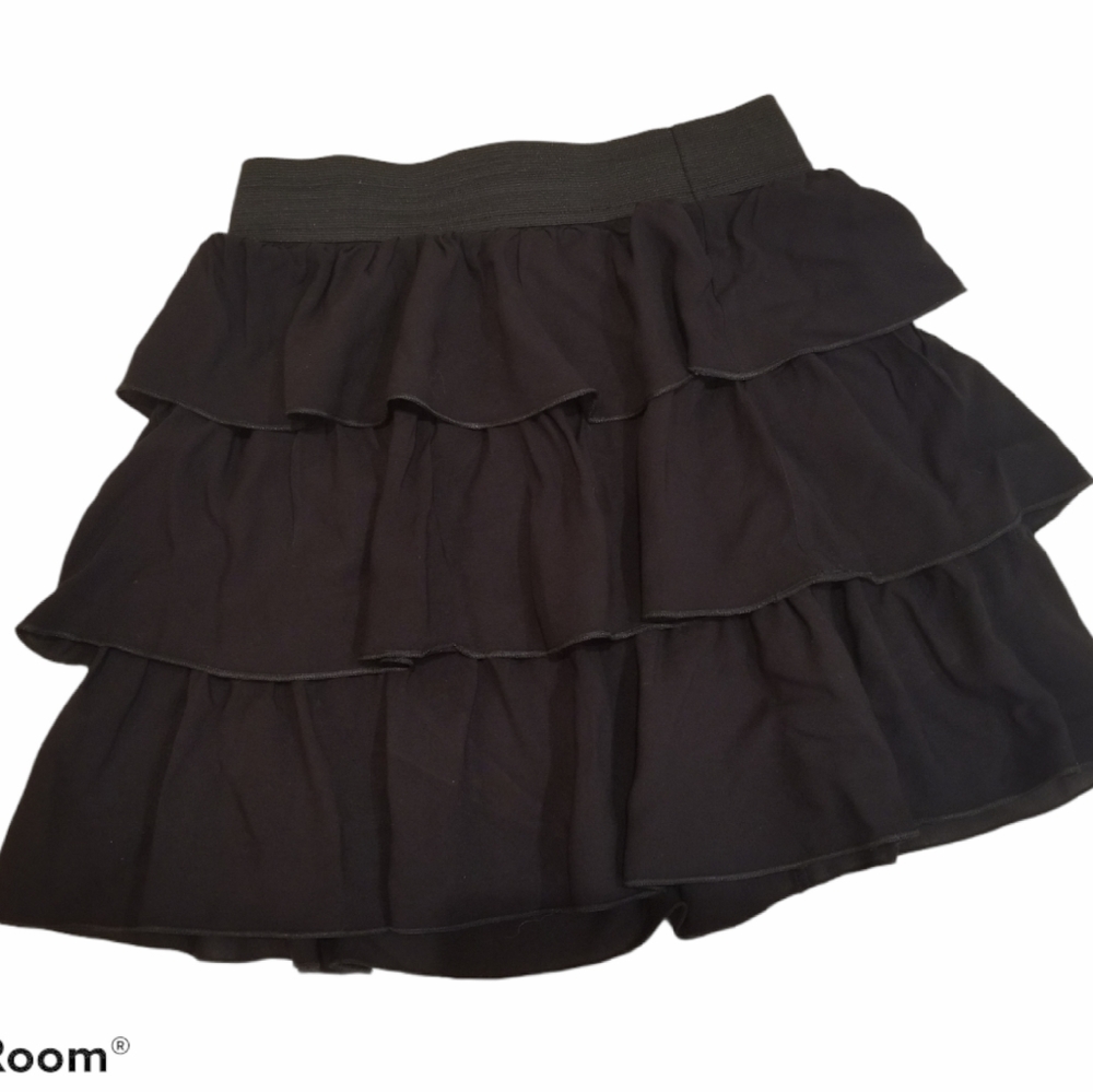 Girls black ruffled skirt
